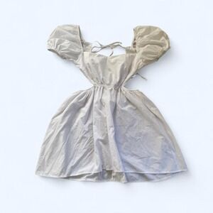 White mini open back dress with puffy sleeves and tie back detail size M
